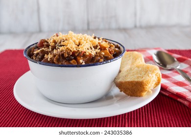 Bowl Of Warm Chili Winter Comfort Food With Corn Bread Muffin And Spoon