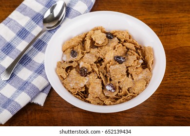 A Bowl Of Wheat Bran Cereal With Raisin