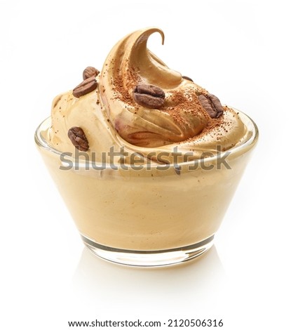 bowl of whipped caramel and coffee mousse cream dessert isolated on white background