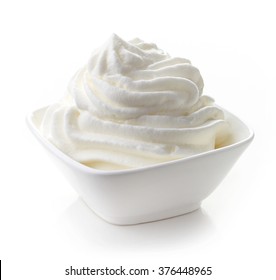 Bowl Of Whipped Cream Isolated On White Background