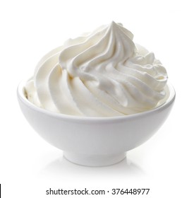 Bowl Of Whipped Cream Isolated On White Background