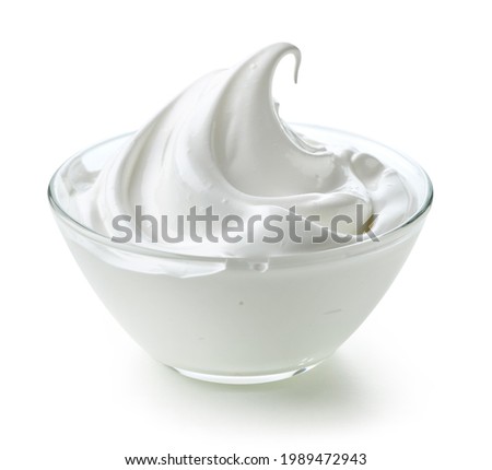 bowl of whipped egg whites isolated on white background