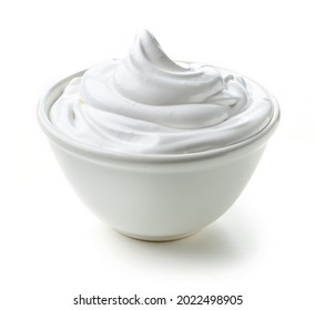 bowl of whipped egg whites and sugar cream isolated on white background