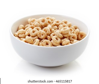 Bowl of Whole Grain Cereal rings isolated on white background