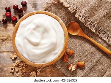 Bowl Of Yogurt, Berries And Nuts. Top View