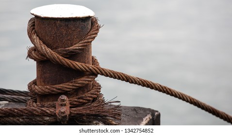 Bowline knot boat rope of a waiting boat over Danube river