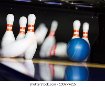 Bowling Ball Hitting Motion Blurred Pins