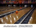 Bowling ball on the bowling lane in motion blur. Horizontal shot.