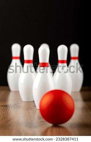 bowling ball and pins on the playing field. bowling ball and pins on the track. bowling background. Active leisure. Sport game. Bowling game equipment concept. copy space. Close up.