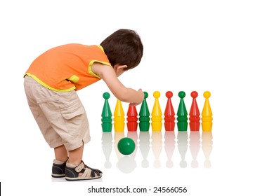 Bowling game, a child throws a ball