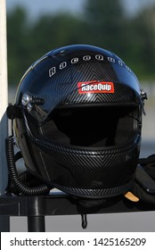 BOWLING GREEN, KY - JUNE 16, 2018: A RaceQuip Helmet Sits On A Pit Box At The National Corvette Museum Motorsports Park In Bowling Green, Kentucky.