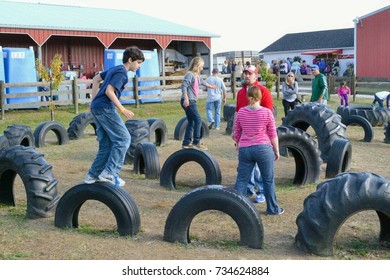 Bowling Green KY USA - October 27, 2013 : Kids Playing On Tires