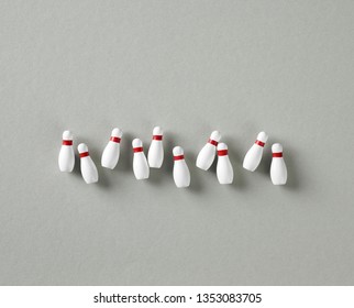 Bowling Pins On Grey Background, Top View