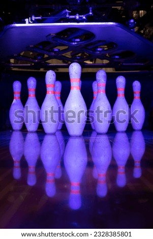 bowling pins on the playing field. bowling pins on the track. bowling background. Active leisure. Sport game. Bowling game equipment concept. copy space. Close up.