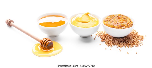 Bowls Of Honey, Mustard And Sauce On White Background