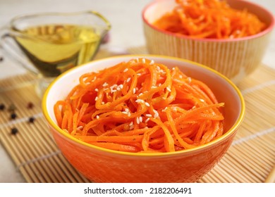 Bowls With Tasty Korean Carrot Salad, Closeup