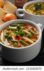 Bowls Of Tasty Turnip Soup On Dark Table