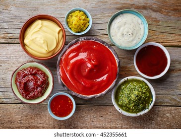 bowls of various dip sauces, top view - Shutterstock ID 452355661