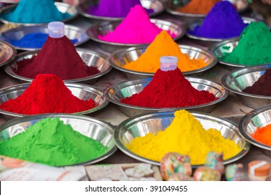 Bowls Of Vibrant Colored Dyes In India - Holi Colors.