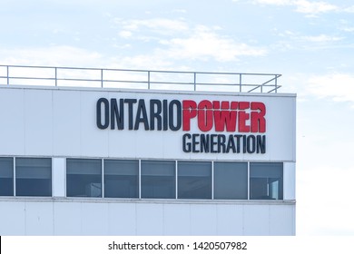 Bowmanville, Ontario, Canada-June 9, 2019: Sign Of Ontario Power Generation On The Building At Darlington Nuclear Stations In Bowmanville, Ontario 