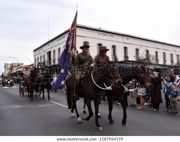 Bowral,\
Australia - Sept 22, 2018. Tulip Time Street Parade features\
classic and vintage cars, marching bands and various floats. Locals\
and visitors line the street to celebrate\
Spring.