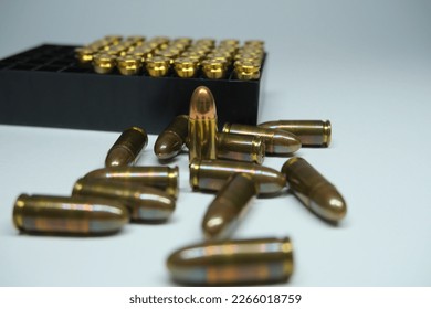 Box of 9mm ammunition and ammunition.