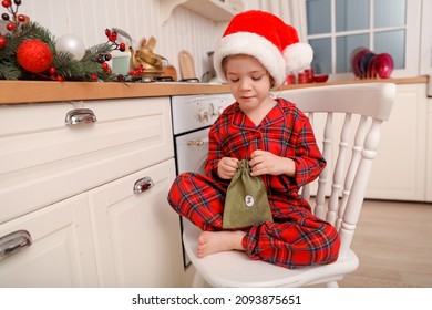 box with advent calendar green bag sits at modern white and wooden kitchen - Powered by Shutterstock