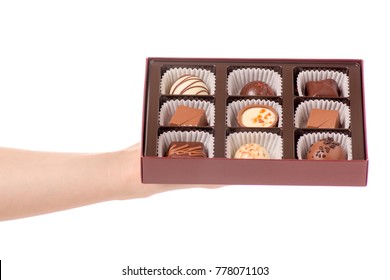 The Box Chocolate Candies In Hand On White Background Isolation