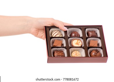 The Box Chocolate Candies In Hand On White Background Isolation