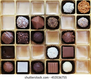 A Box Of Chocolates Partially Empty Viewed From Above