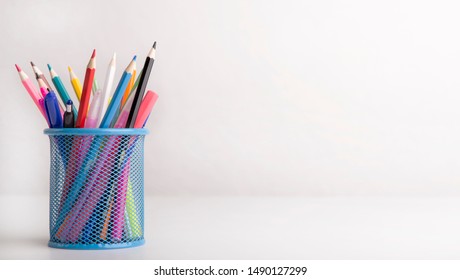 Box with colored pencils isolated on white background with copy space for sale text, panorama - Powered by Shutterstock