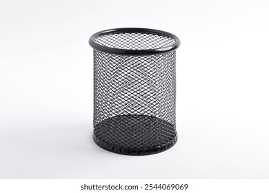 Box of colored pencils isolated on white background. Empty black basket Pen holder. Close up - Powered by Shutterstock