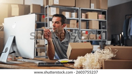 Box, computer and supply chain with man in distribution center for inventory checklist or update. Logistics, reading and schedule with employee in office for delivery, ecommerce or shipping manifest