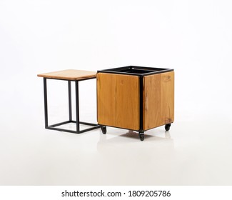 A Box Concept, A Combination Of Wood And Iron, So That It Becomes A Table And Chair That Is Very Compact And Doesn't Take Up Space.