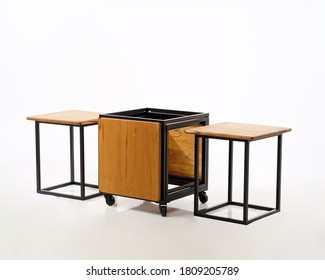 A Box Concept, A Combination Of Wood And Iron, So That It Becomes A Table And Chair That Is Very Compact And Doesn't Take Up Space.