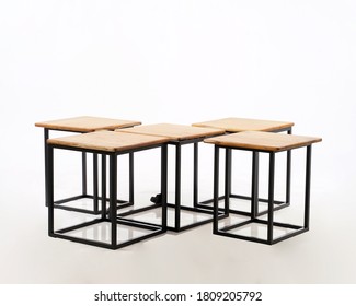 A Box Concept, A Combination Of Wood And Iron, So That It Becomes A Table And Chair That Is Very Compact And Doesn't Take Up Space.