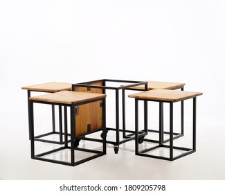 A Box Concept, A Combination Of Wood And Iron, So That It Becomes A Table And Chair That Is Very Compact And Doesn't Take Up Space.