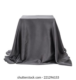 Box Covered With Black Cloth. 