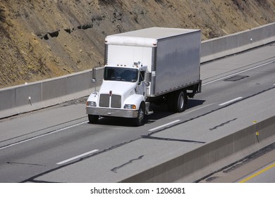 Box Or Delivery Truck On The Highway