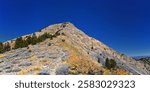Box Elder Peak view looking up from hiking trail, American Fork Canyon. Wasatch Range Rocky Mountains, Utah, United States.