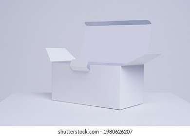 The Box Of Face Mask With Blank For Mockup Purpose And Medical Protective Mask On White Background