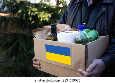 box full of food for Ukrainian refugees - Shutterstock ID 2134639073