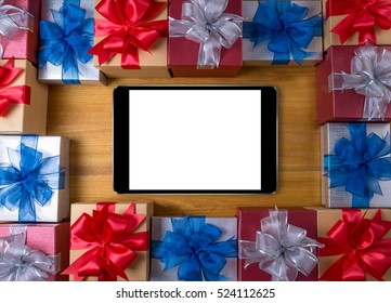 BOX Gift  And Small Gift Wrapped , Presents And Christmas ,  Man Using Ipad And Gifts, Celebrations And Christmas Concept