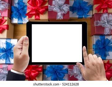 BOX Gift  And Small Gift Wrapped , Presents And Christmas ,  Man Using Ipad And Gifts, Celebrations And Christmas Concept