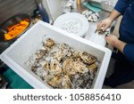 box with ice and mussels
