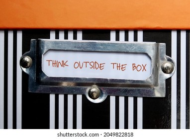 Box With Label THINK OUTSIDE THE BOX , Concept Of Breaking Status Quo To Find Innovative Solution Or Create Something Differently, Stand Out From The Crowd.