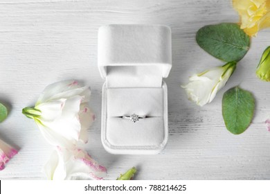 Box With Luxury Engagement Ring On Light Background, Top View