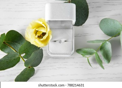 Box With Luxury Engagement Ring On Light Background, Top View