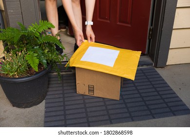 A Box And A Mailer On A Doorstep, Online Order Home Delivery Concept