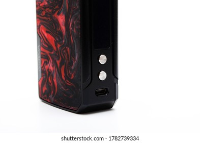 Box mod Drag 2 refresh edition with Pnp tank on a white background. Voopoo drag 2. Box mod packing, black-red in macro and in hands. July 2020. Los Angeles, USA